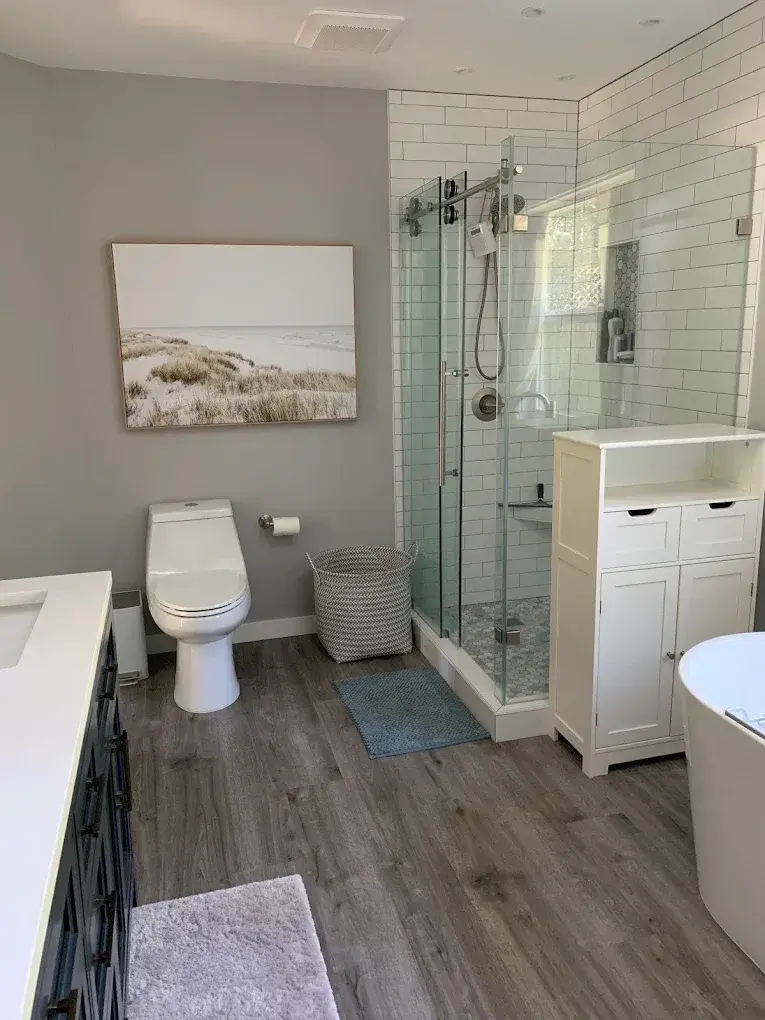 Bathroom with a frameless glass shower and subway tile