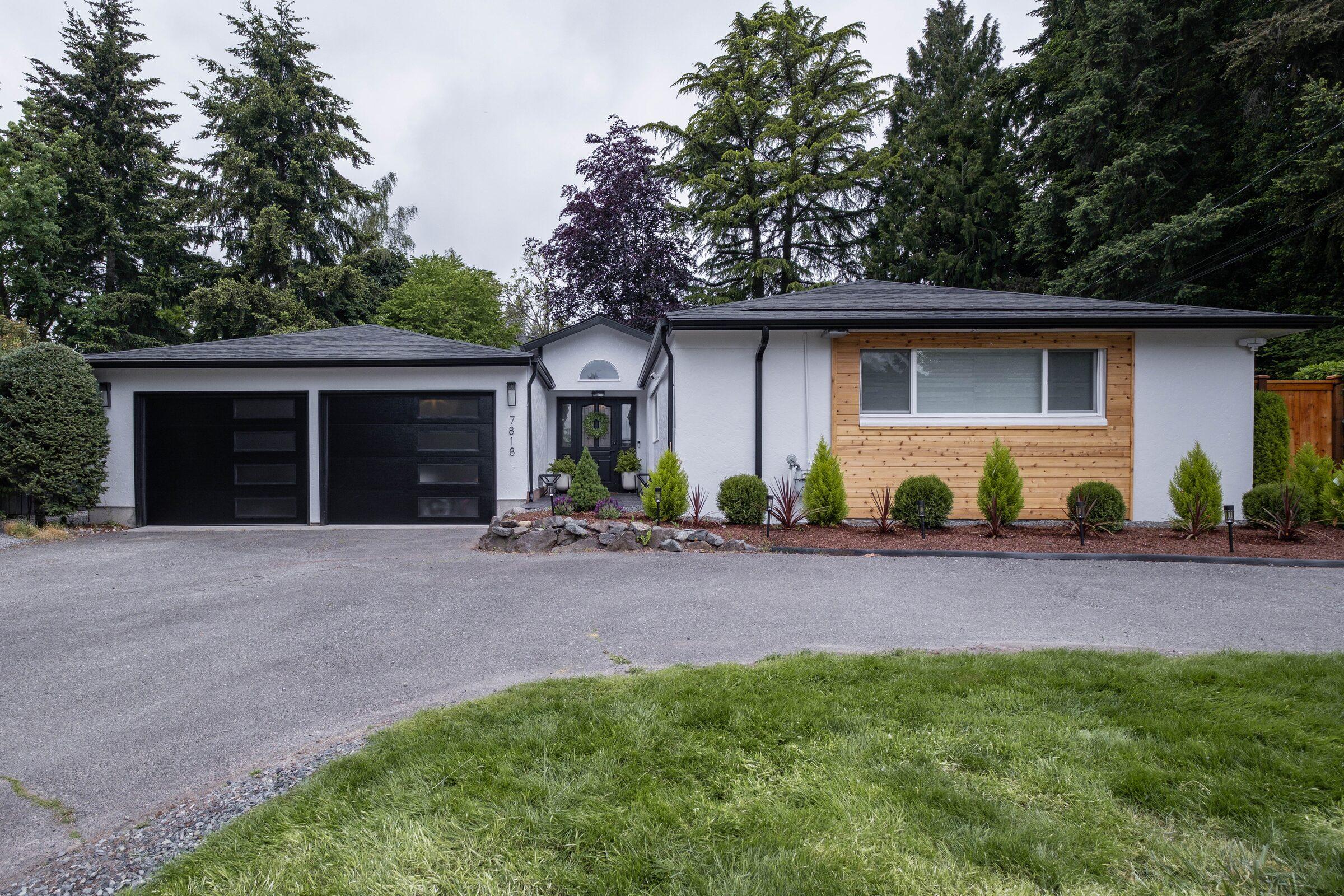 Detached two-car garage with new siding